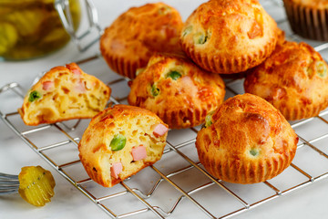 Delicious freshly baked homemade Savory muffins with Parmesan cheese, sausage or ham and green...