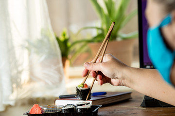 Order sushi during quarattine online. Eat sushi at home.