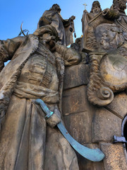 A bored Turkish Sultan Relaxing on the Charles Bridge