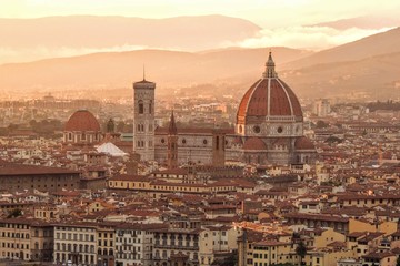 Fototapeta na wymiar View of the city of Florence Italy at sunset, highlights the Duomo and the Cathedral of Florence Santa Maria del Fiore.