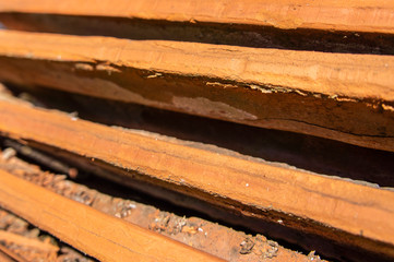 Old red roof tiles closeup. Macro photo.
