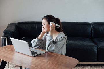 young asian beauty woman use laptop at home