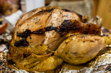 Grilled whole chicken close-up. Macro photo.