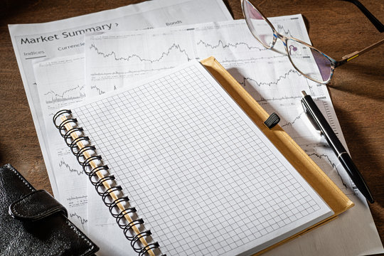 Business Items On A Wooden Desk. Close Up. Eye Level. Working Process