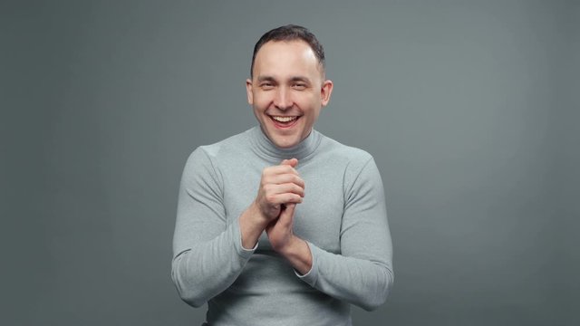 Video of plotting man in turtleneck