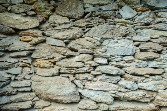 alter Steinmauer als Hintergrundbild