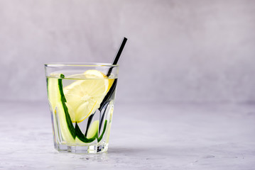 Glasses of Healthy Detox Water with Lemon and Cucumbers Diet Drink Straw Copy Space