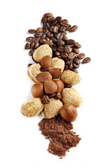 coffee grains, cocoa powder and nuts isolated