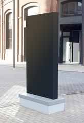 Blank black vertical pylon stand mockup brick building, side view - obrazy, fototapety, plakaty