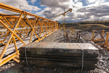 Crane and scaffolding structures intended for the construction of a bridge in Spain