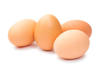 a lot of chicken eggs on a white background