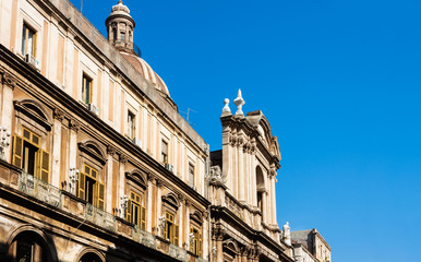 Traditional architecture of Sicily in Italy, typical street of Catania, facade of old building...