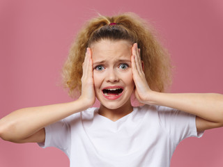 portrait of a young woman screaming