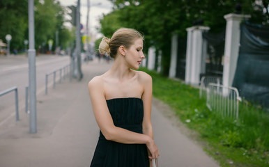 Outdoors portrait of beautiful young woman. Selective focus.