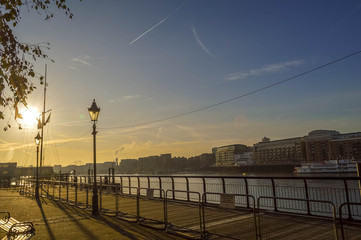 Sunrise at the promenade near Tower Bridge in London Borough of Tower Hamlets