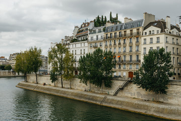 Typical old Paris architecture and deserted streets with no tourists while citizens stay at home in...