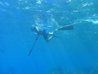 man snorkeling in the ocean