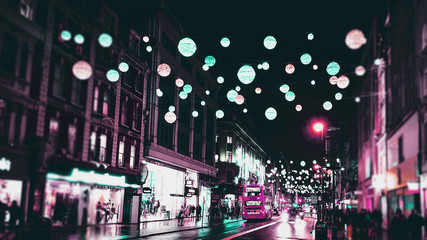 London festive Christmas street lights and decorations in cyberpunk colours