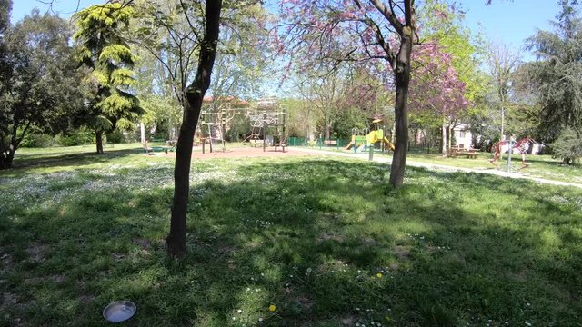 Walking Past Empty Children's Park Due to Coronavirus (COVID-19) on a Bright Sunny Spring Day in Toulouse, France