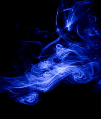 Blue smoke on black background