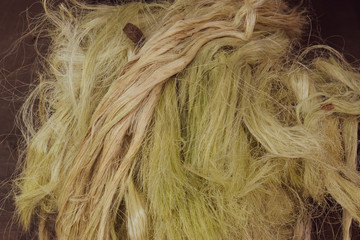 sisal fiber  from the agave or sisal plant used to make rope or twine for many industrial uses
