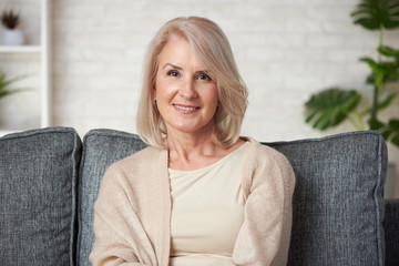 Portrait of older woman smiling at home