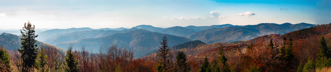 View from high mountain on picturesque landscape autumn Carpathian. Dramatic sky. Ukraine, Europe.