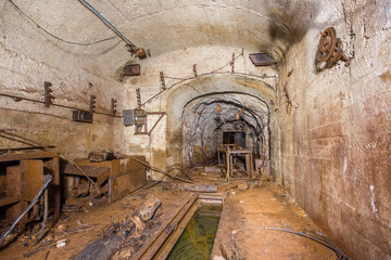 Fototapeta na wymiar Underground abandoned bauxite ore mine tunnel with concrete lining