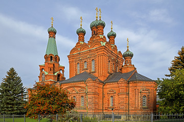 Fototapeta na wymiar Tampere Red Orthodox Church (1896-1899) also known as St. Alexander Nevski and St. Nicolas Church. Suomi