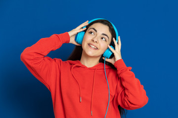 Brunette young girl wearing red jersey