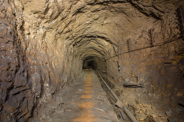 Naklejka premium Underground abandoned bauxite ore mine tunnel