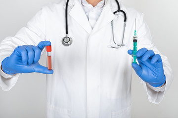 Doctor holding blood sample
