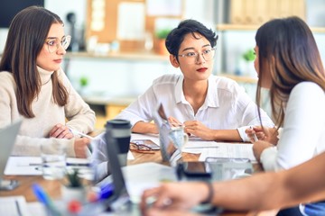 Group of business workers working together at the office