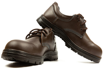 Shoes safety isolated on white background. Oil and acid resistant shoes. Safety boots  isolated on white background. Work Boots for industry.