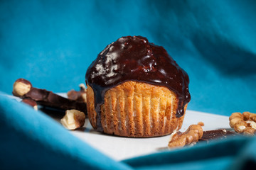 Delicious Chocolate Muffins. Homemade muffin with chocolate topping. Easter sweet dessert. Close up view.