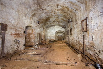 Underground abandoned bauxite ore mine tunnel with concrete lining