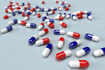 散りばめられた赤と青のカプセル剤のCGグラフィック