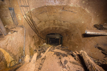 Underground abandoned bauxite ore mine tunnel with concrete lining
