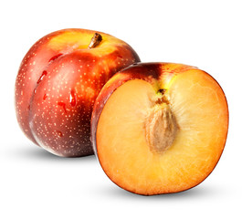 Whole and half red plums on a white isolated background. Clipping path. Design element for print and web.