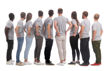 Obraz premium group of diverse young people looking at a large white screen.