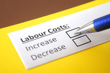 Fototapeta premium One person is answering question about labour costs.