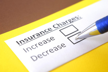 Obraz premium One person is answering question about insurance charges.
