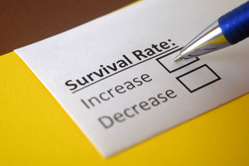 Obraz premium One person is answering question about survival rate.