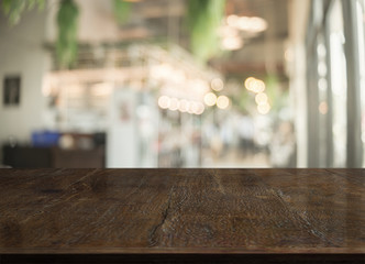 3D Rendering, Wooden top table with bokeh light effect and blur restaurant on background, blur background