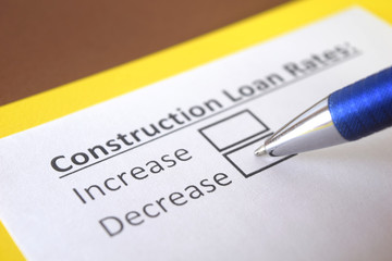 Obraz premium One person is answering question about construction loan rates.