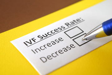 Obraz premium One person is answering question about IVF success rate.