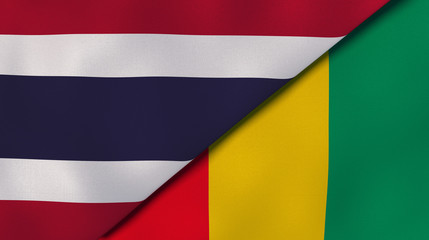 The flags of Thailand and Guinea. News, reportage, business background. 3d illustration