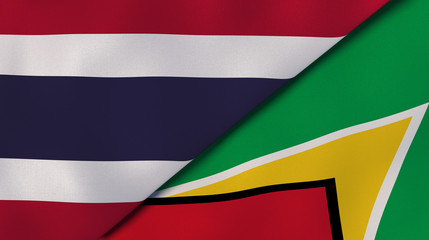 The flags of Thailand and Guyana. News, reportage, business background. 3d illustration