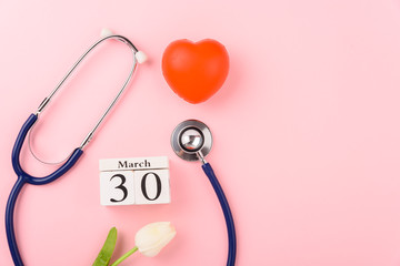 Doctor's Day concept, flat lay top view, equipment medical red heart and stethoscope
