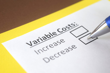 Obraz premium One person is answering question about variable costs.
